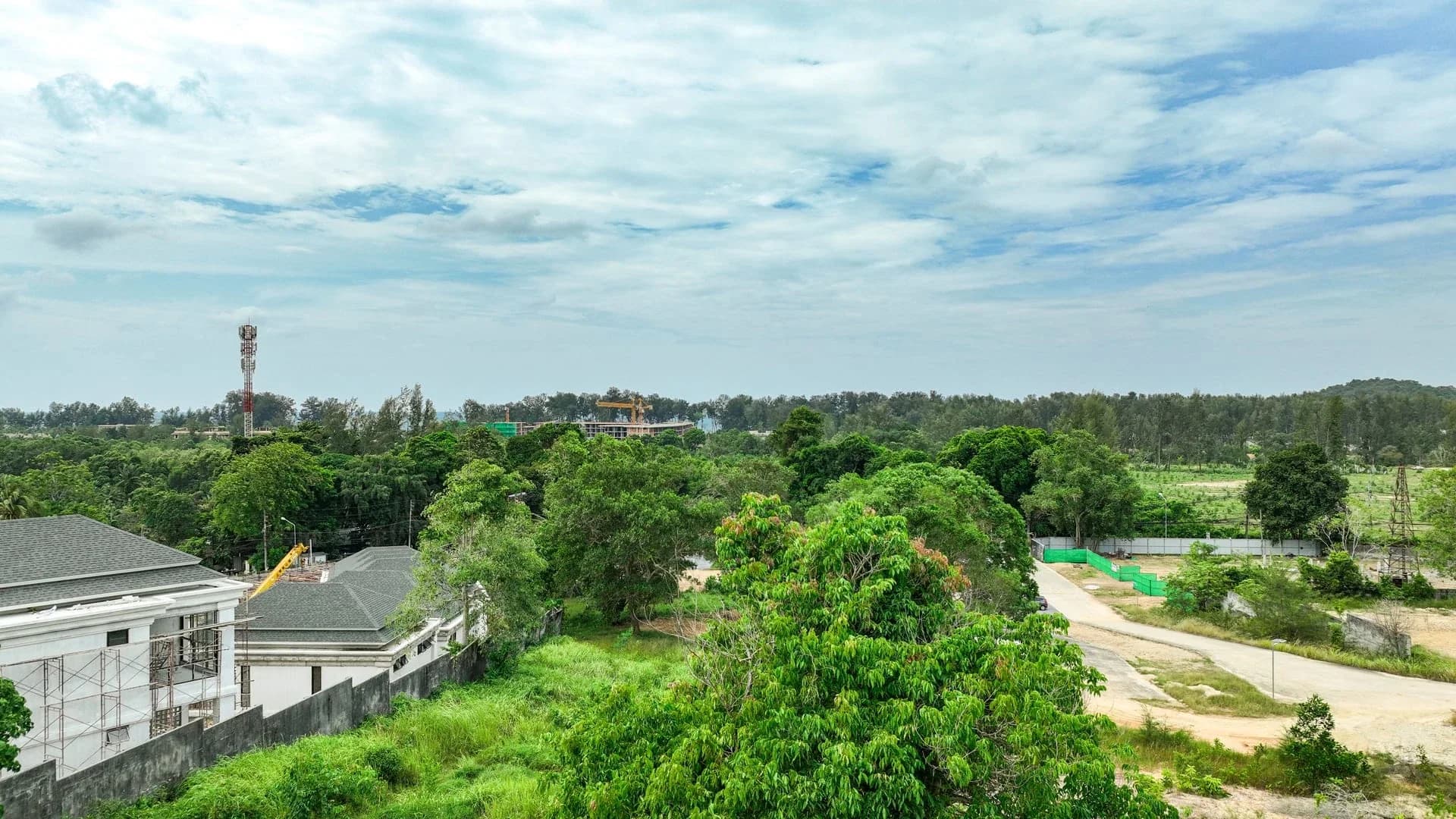 Aerial view of the Layan Verde project site and surrounding terrain